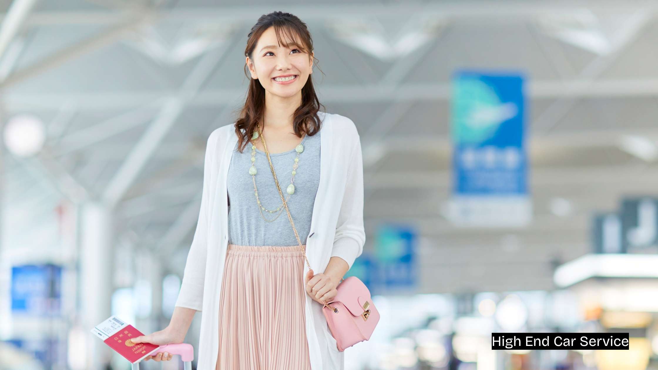 Smiling woman at airport with passport